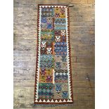 A Chobi Kilim runner rug of all over geometric design, 204cm x 66cm