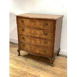 A bur walnut serpentine chest, fitted with four drawers, raised on cabriole supports, with