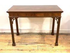 A Chippendale style mahogany side table, rectangular top over figured frieze, raised on blind fret