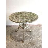 A floral cast aluminum garden table, the circular top raised on triple splay supports united by