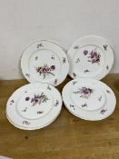 A set of six German plates with floral decoration, bases bear stamp of interlocked C's under
