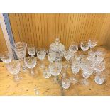 A large quantity of assorted crystal including vase which measures 23cm high, biscuit barrel, wine