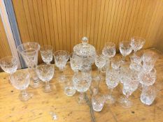 A large quantity of assorted crystal including vase which measures 23cm high, biscuit barrel, wine