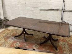 Theodore Alexander - A Large quality Georgian style mahogany twin pillar extending dining table, the