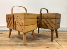 A near pair of cantilever sewing boxes each with a bentwood looped handle, H45cm, W43cm, D24cm