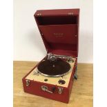 A Decca travel record player in red travelling case measures 17 x 29 x 42
