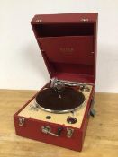 A Decca travel record player in red travelling case measures 17 x 29 x 42