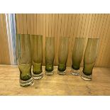 A group of six glass vases in shades of green of tulip form with etching decoration including birds,