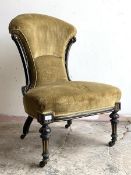 A Victorian ebonised balloon back chair in the aesthetic taste, upholstered in a green velvet