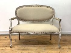 A Coach House two seat sofa, late 20th century, in the Louis XVI taste, with limed wooden frame,