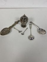 A 19thc pepperette, markings rubbed (8cm) and an 1827 Edinburgh silver condiment spoon, two other