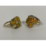 Two 9ct gold cluster rings, both set opals, one also set chip diamonds (O) (combined: 6.16g)