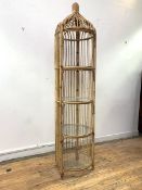 A Vintage bamboo etagere, circa 1970, with four open circular glazed shelves, H190cm, W50cm