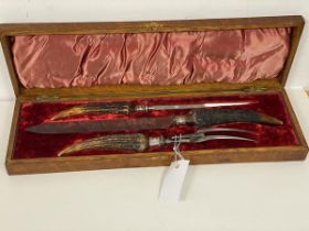 A horn handled three piece carving set, knife inscribed Allen & Darwin silversmiths, Sheffield (