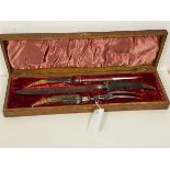 A horn handled three piece carving set, knife inscribed Allen & Darwin silversmiths, Sheffield (