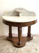 A Victorian marble topped demi-lune Duchess wash stand, with raised back and open shelf over a