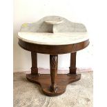 A Victorian marble topped demi-lune Duchess wash stand, with raised back and open shelf over a