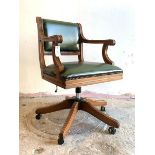 A Reproduction desk chair, studded faux leather upholstered seat and back, reeded open arms,