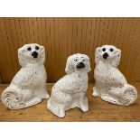 A pair of 19thc Staffordshire chimney spaniels one repaired measures 28cm high and another (3)