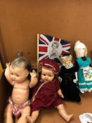 A mixed lot including a group of dolls one marked Reliable which measures 39cm high and three