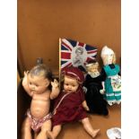 A mixed lot including a group of dolls one marked Reliable which measures 39cm high and three