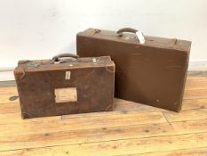 An early 20th century leather suitcase with old paper labels, (W56cm) together with another larger