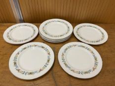 A set of nine Royal Doulton pastorale dinner plates each measures 26.5cm diameter