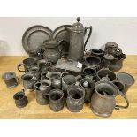 A large quantity of 19thc and later pewter, including coffee pot (33cm), mugs, measures, plates,