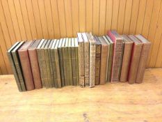 A collection of books including those by Thomas Hardy, Thackeray, Charles Dickens, Shakespeare (a