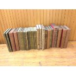 A collection of books including those by Thomas Hardy, Thackeray, Charles Dickens, Shakespeare (a