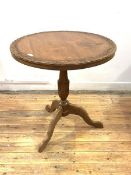 An Anglo-Indian hardwood occasional table, the circular top with relief carved interlaced foliate