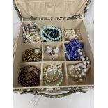 A quantity of faux and cultured pearls, mostly necklaces and bracelets but includes earrings,