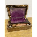 A 19thc writing slope with burr walnut veneer exterior, complete with two inkwells and fitted