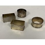 A mixed group of silver napkin holders (combined: 109g)