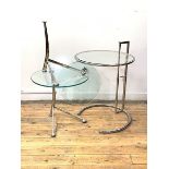 A post modern lamp table, with circular plate glass top on a rise and fall chrome base, (H76cm,