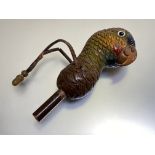 A novelty painted carved wooden umbrella handle, modelled as a parrot's head. Overall 17cm