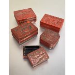 A group of five red cinnabar lacquer boxs and covers, mostly Chinese c. 1900 and later: four of