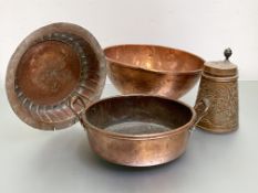 A small copper cream or jam pan, 19th century, circular, with twin handles; a stamped copper