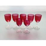 A matched set of seven cranberry glass wines. (7) Tallest 13.5cm