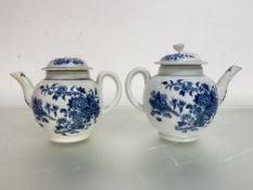 Two Worcester blue and white porcelain bullet-form teapots in the Fence and Two Birds pattern, of