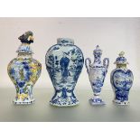 A group of 18th and 19th century Delft comprising: a jar and cover of slender form, with serpent
