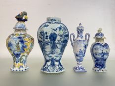 A group of 18th and 19th century Delft comprising: a jar and cover of slender form, with serpent