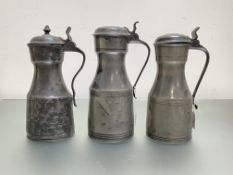 Three Scottish pewter tappit hens, late 18th/early 19th century, two with shallow domed covers,