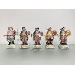 A group of porcelain figures of Falstaff: a Derby figure, in a blue coat, early 19th century; and