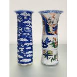 Two Chinese porcelain vases of cylindrical form: the first in blue and white, with flared rim,