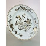 A Chinese Export porcelain large dish, late 18th/early 19th century, decorated en grisaille with