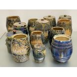 A collection of eleven Kircaldy spatter ware Rosslyn storage jars, probably Morrison & Crawford c.