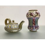 A Cantagalli lustre-glazed teapot, c. 1900, of flattened spherical form, with twin serpent handle
