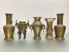 A group of Chinese bronze vases comprising: a pair of shouldered baluster form, each with a band