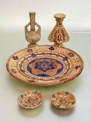 A group of copper lustre wares in the Hispano-Moresque taste, 20th century, comprising: a charger,
